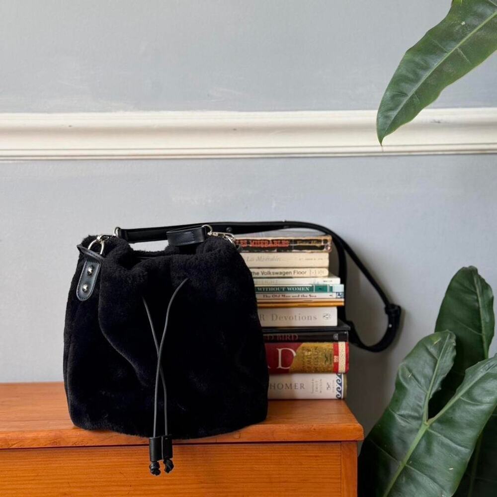 House of Harlow black faux fur + leather bucket bag